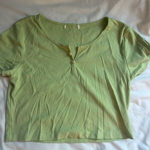 light green crop top with buttons